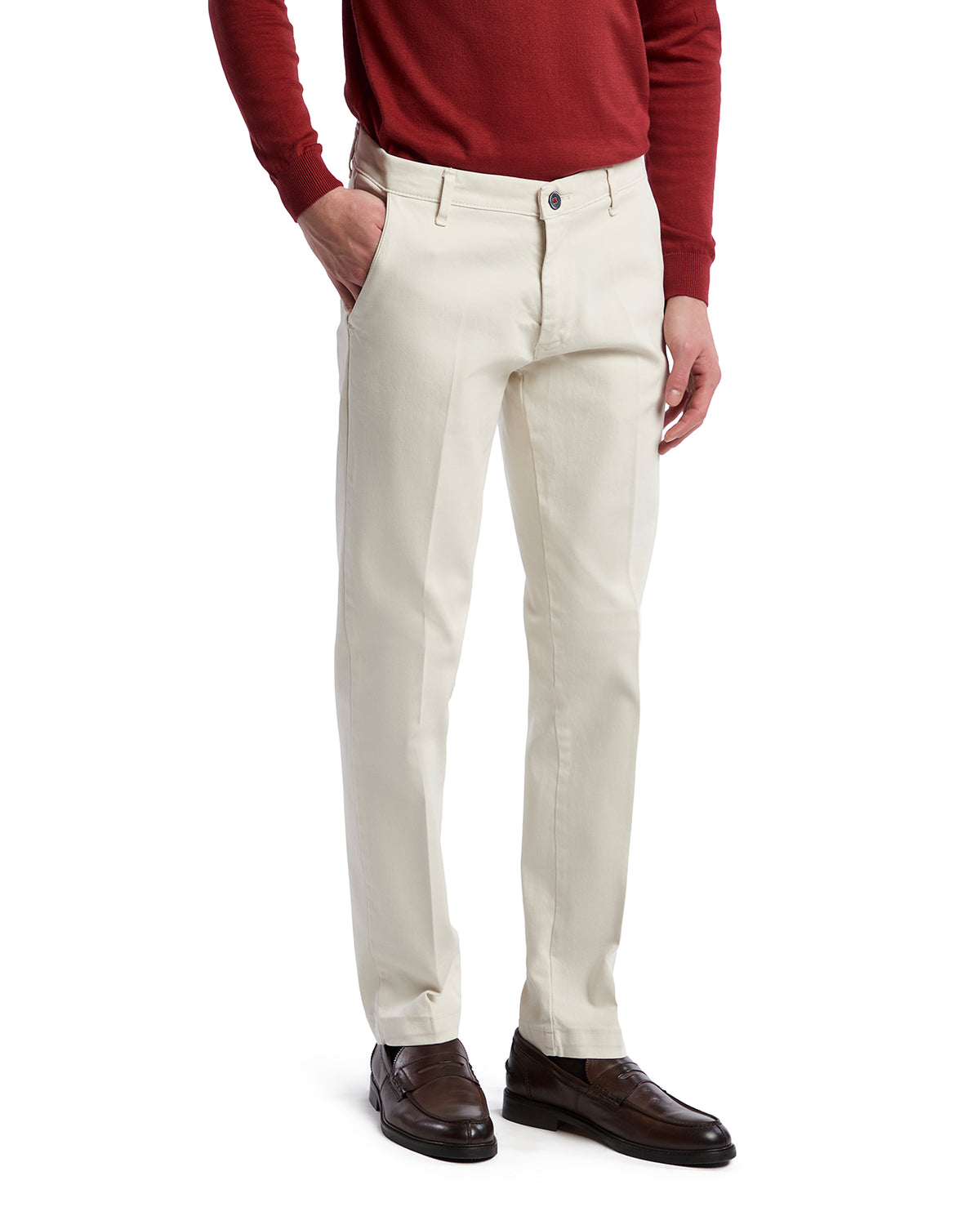 Men's cream chinos, tailored fit, lightweight cotton, paired with a red sweater and brown dress shoes.