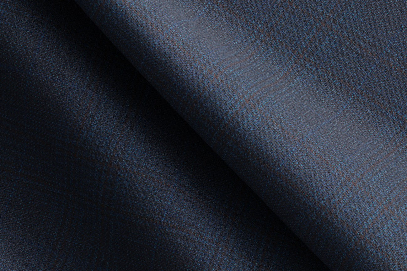 Bespoke 130s Prince of Wales wool trousers in blue Caccioppoli